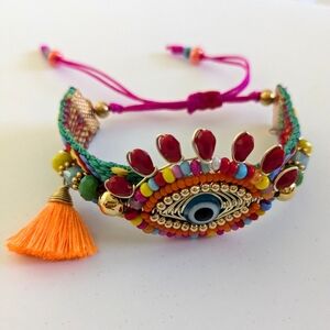 Eye bracelet with tassel